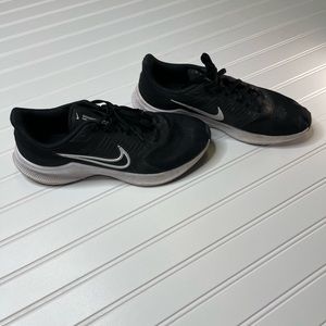 Size ten boys black nike running shoes